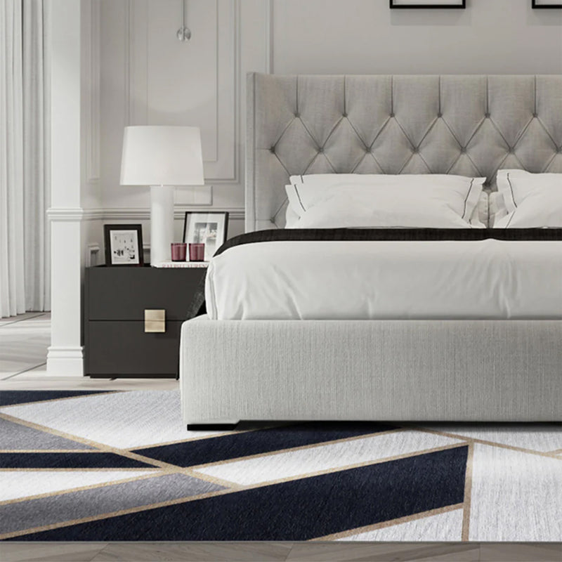 art deco stiliaus gatbsy dark blue kilimas miegamajame prie lovos
