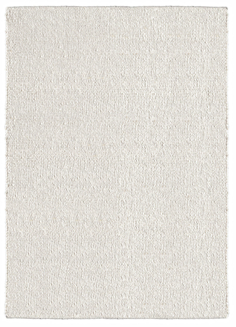 Natūralios vilnos rankų darbo kilimas su mažais burbuliukais, spalva šviesi smėlinė. Mellow Ivory kilimas Makeyourcasa.lt